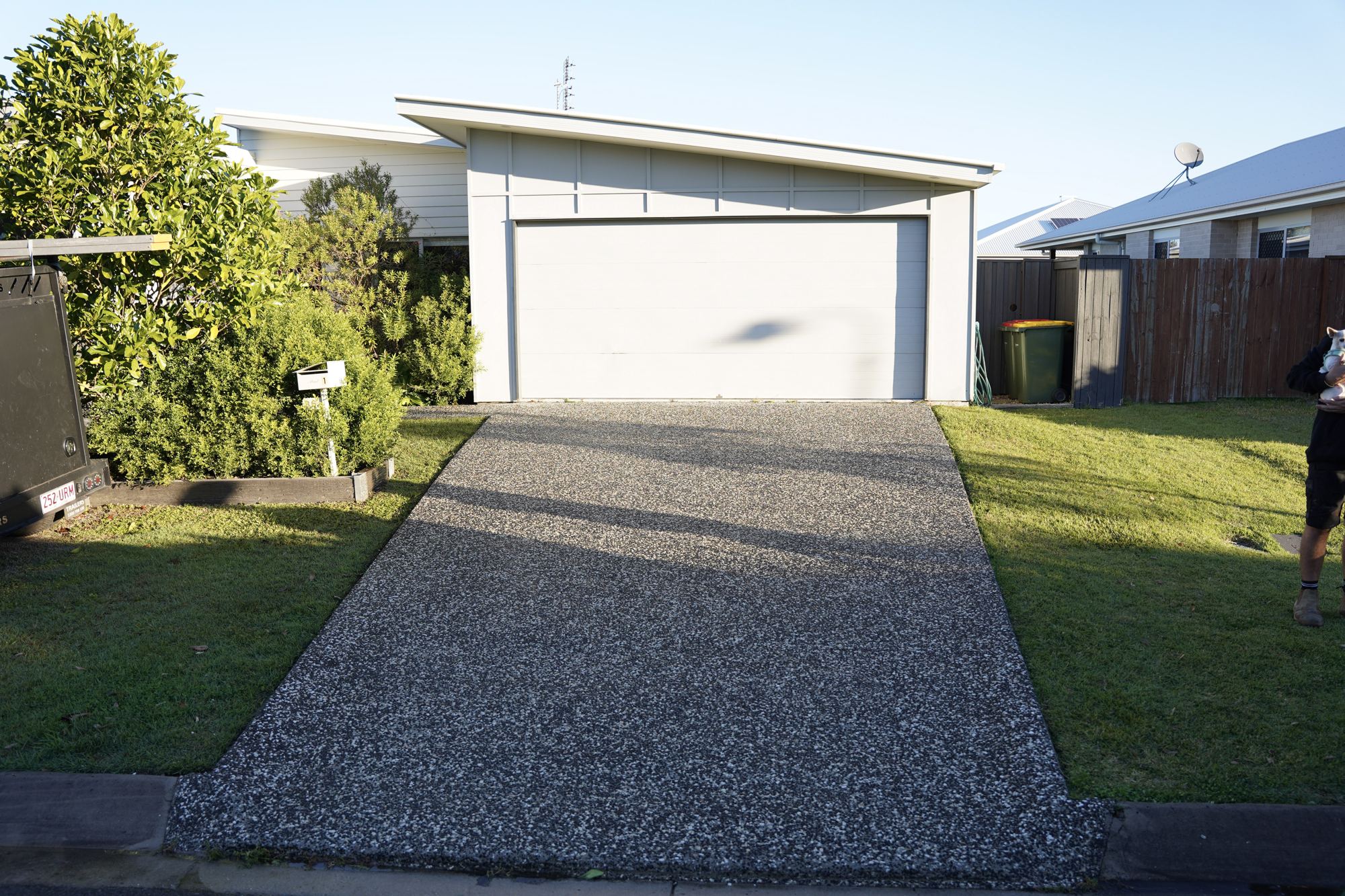A clean exposed aggregate driveway