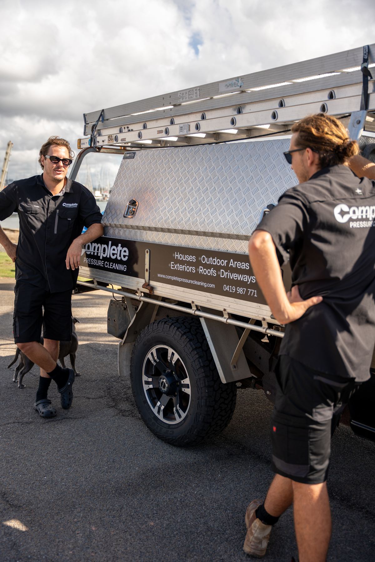 The Complete Pressure Cleaning team at the work ute